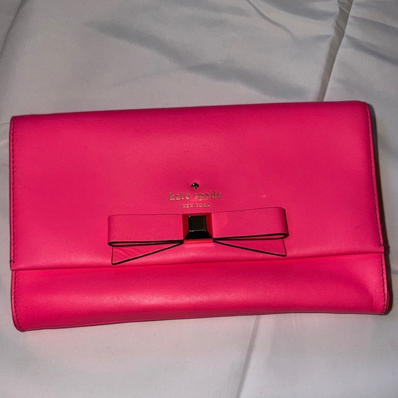 kate spade Handbags - Kate Spade Vibrant Pink Clutch with Bow Accent